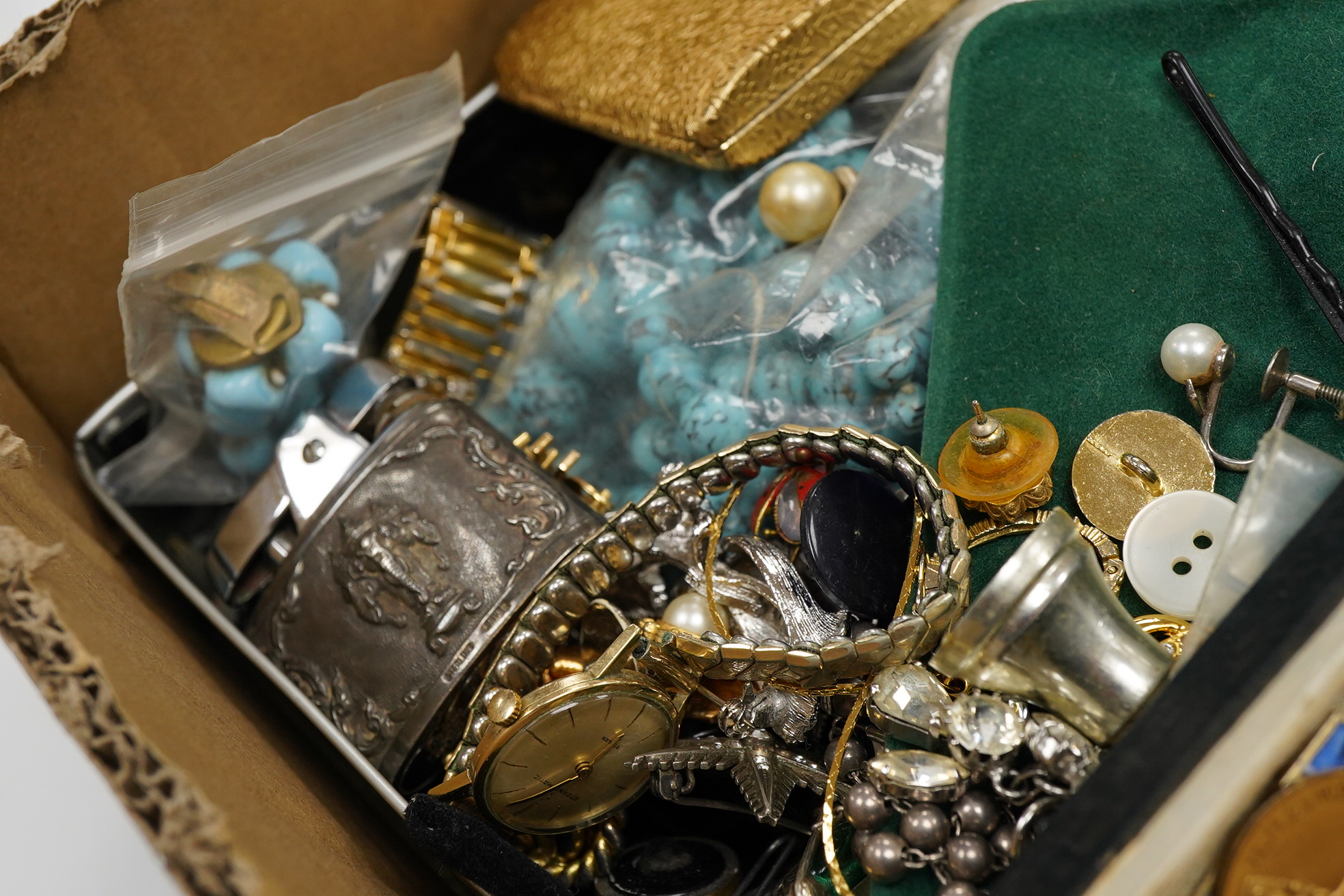 A quantity of assorted mainly costume jewellery, including paste brooch, facetted jet bead necklace, enamelled earrings, wrist watches, compact, lighters, etc.